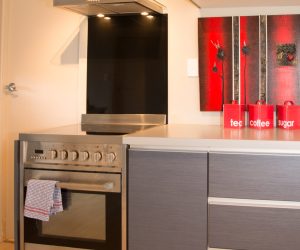 Domestic kitchen - Black splashback & Silver toe kicks