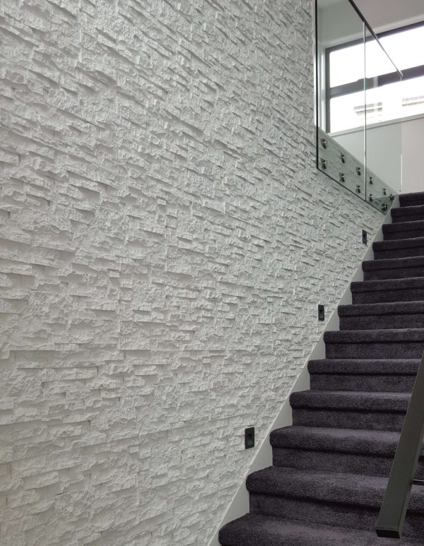 Stack-Stone-White-RockPanel-Staircase-scaled-1.jpg